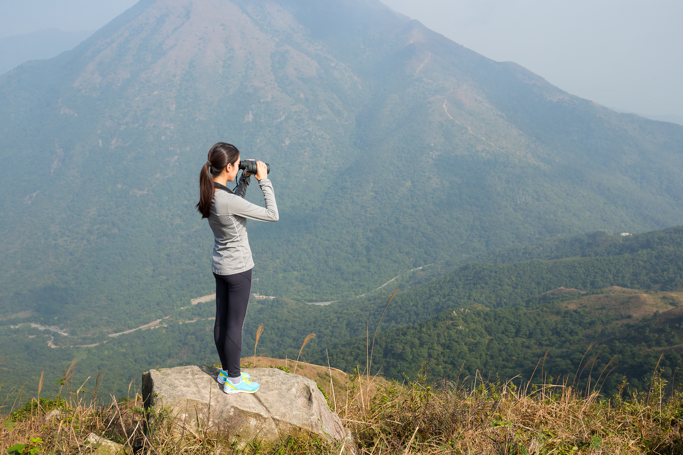 Woman Looking Through Binoculars 